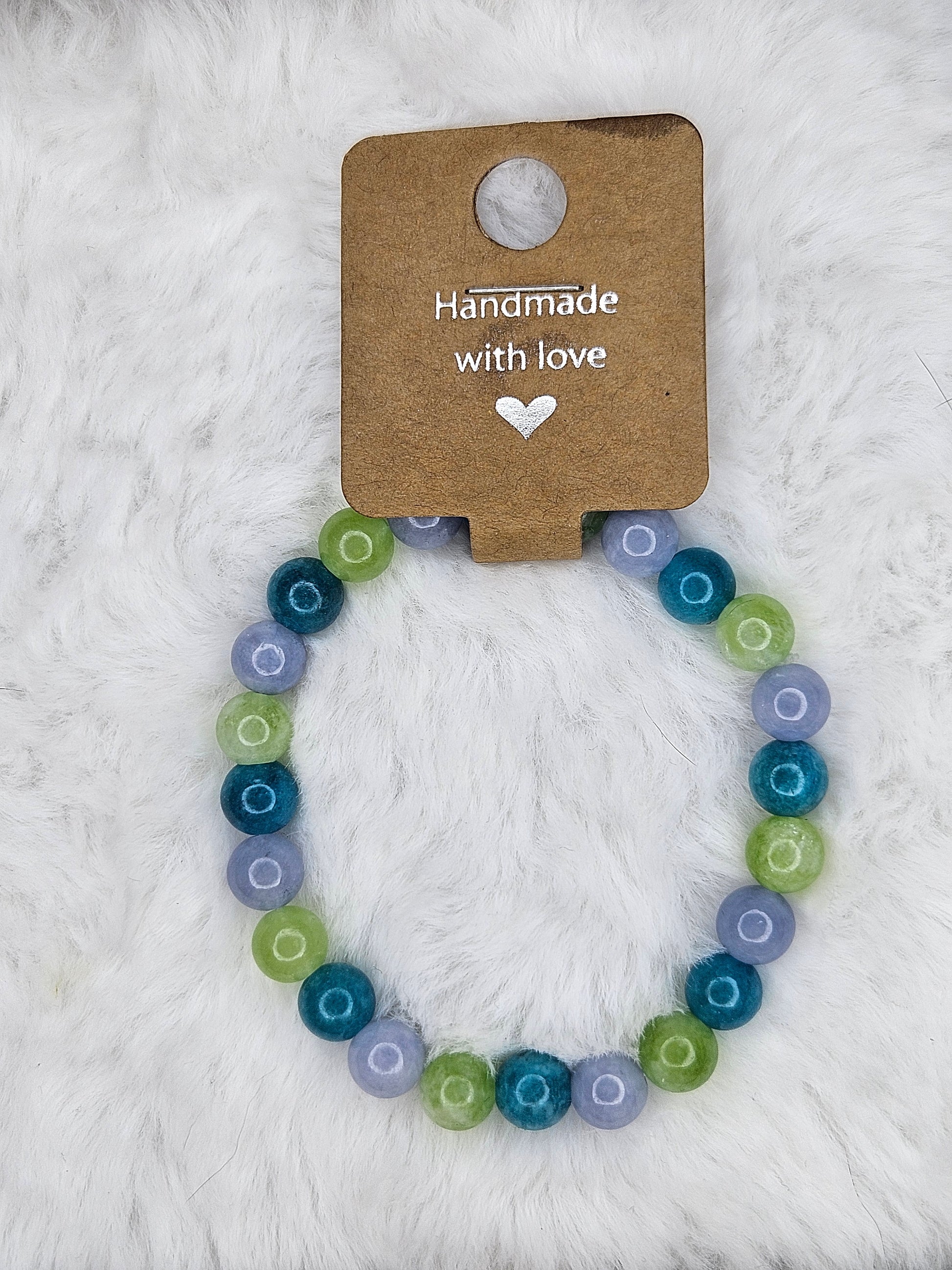 Handmade Peridot, Aquamarine, and Tianhe bracelet 8mm